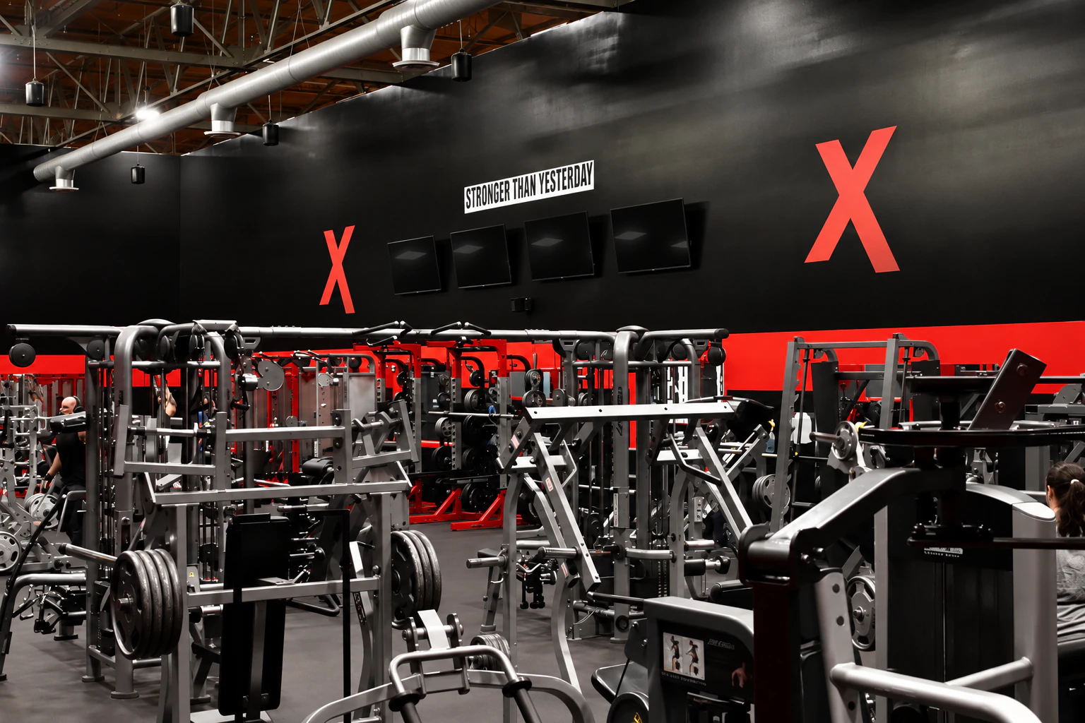 Plate-loaded and selectorized machines across the strength floor at XCEL Sports & Fitness in Fairfield, NJ